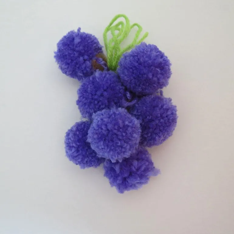 Maletín crea con pompones